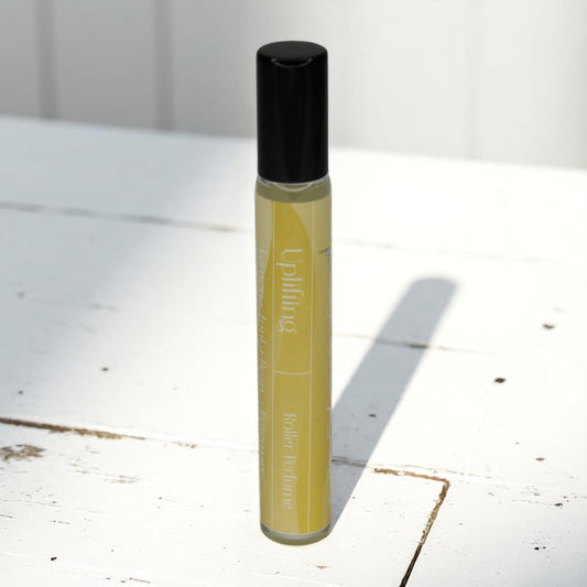 uplifting mood enhancing roller perfume  by whispering daisies